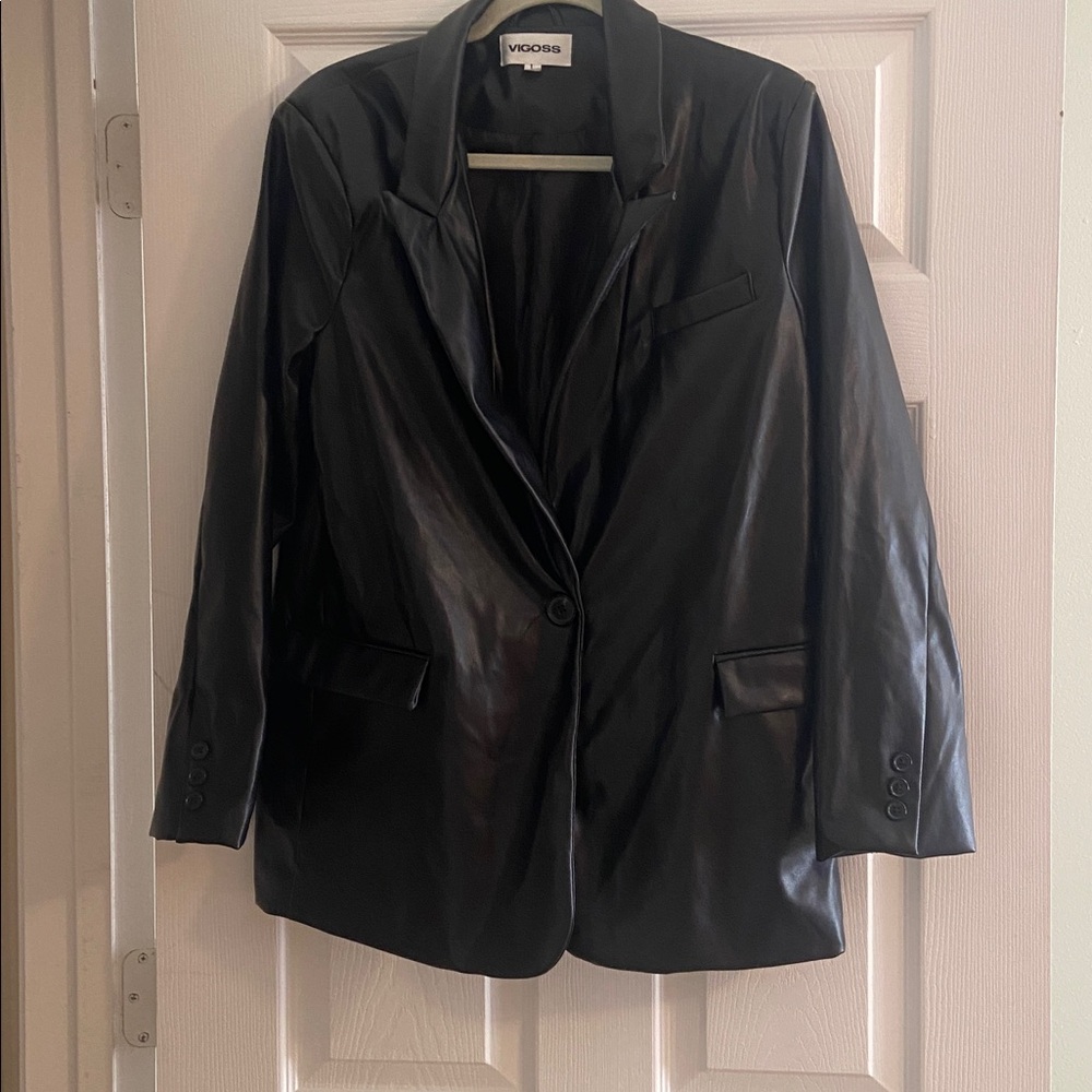 Vigoss Black Polyurethane Jacket, lined in polyester.